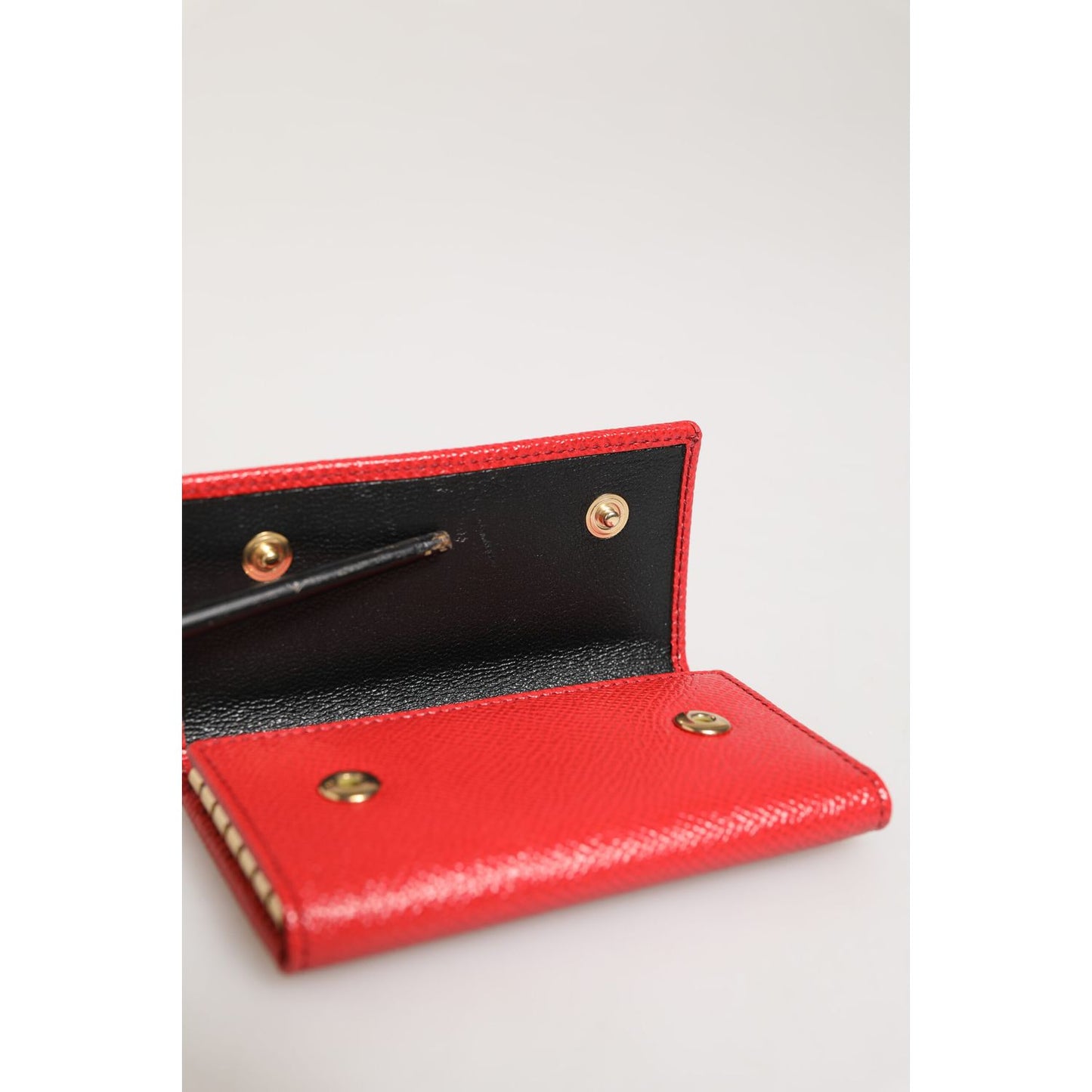 Dolce & Gabbana Red Leather Silver Metal Logo Plaque Trifold Key Holder open view with interior details