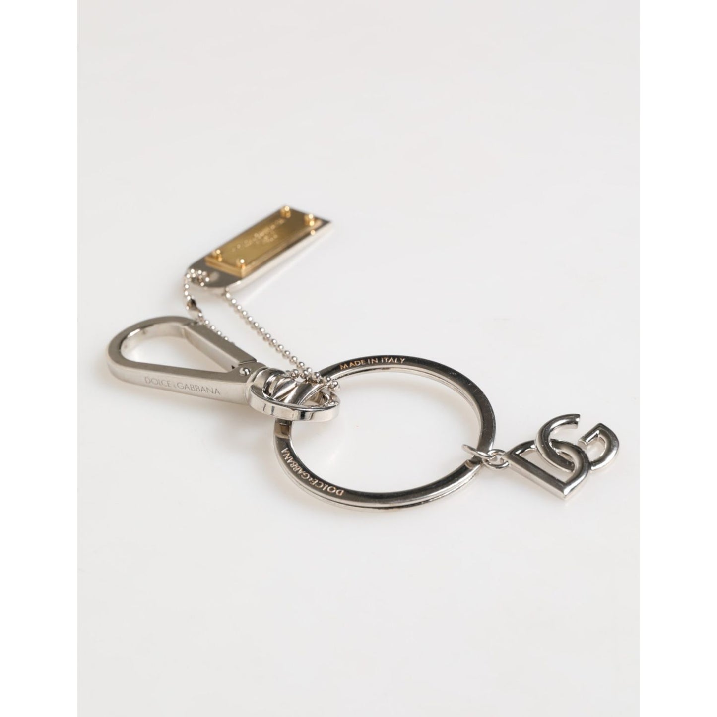 Dolce & Gabbana Silver DG Logo Key Holder Keychain Bag Charm Keyring with lobster clasps and metal chain on white background.