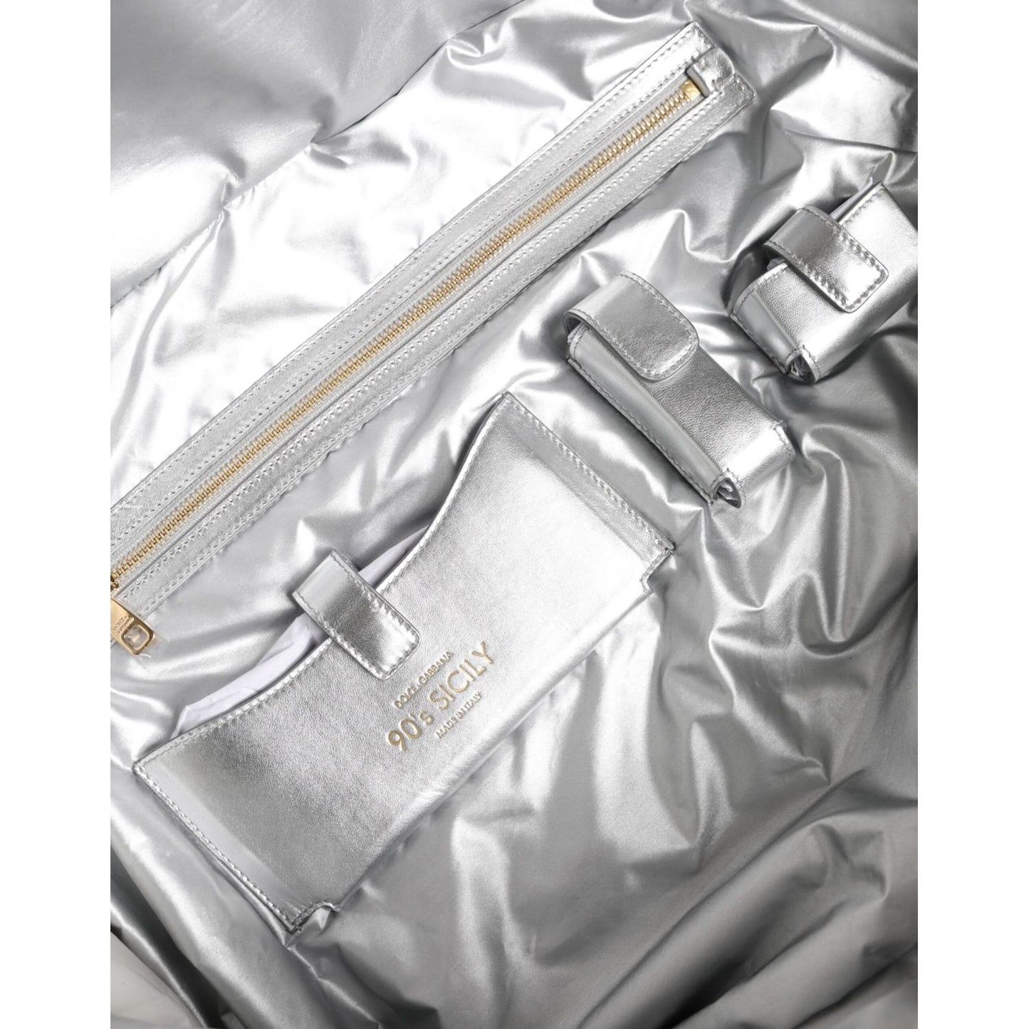Interior of Dolce & Gabbana Silver Quilted Filled Crossbody Shoulder Bag SICILY Bag with zipper and logo details.