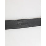 Close-up of Dolce & Gabbana Silver Textured Leather Gold Tone Metal Neckband with logo detail on leather.
