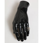 Dolce & Gabbana Silver Tone Pyramid DG Logo Real Brass Ring on black mannequin hand display.