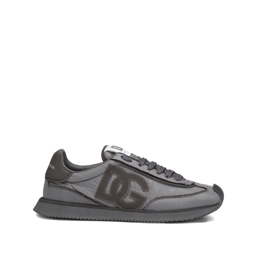 Dolce & Gabbana Sneakers Grey with embroidered logo, lace-up, flat rubber sole, and padded collar.