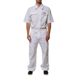 Dolce & Gabbana White Barcode Patch Utility Zip Jumpsuit Pants with short sleeves and cargo pockets, modeled for a modern workwear look.