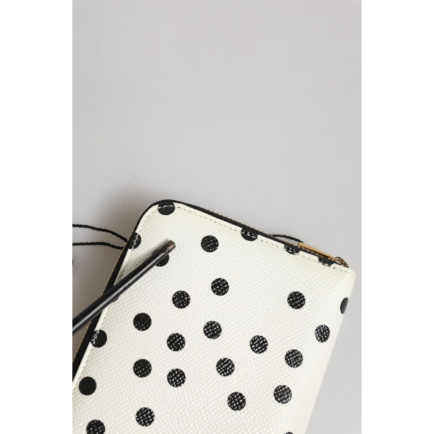Dolce & Gabbana White Black Dotted Leather Zip Around Continental Wallet featuring elegant polka dots and a classic design.
