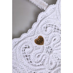 Close-up of Dolce & Gabbana White Cordonetto Lace Beatrice Tote Shopping Bag featuring heart motif and intricate lace design.