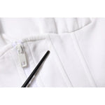 Close-up of zipper on Dolce & Gabbana White Corset Stretch Cotton Top T-shirt showing fabric texture.