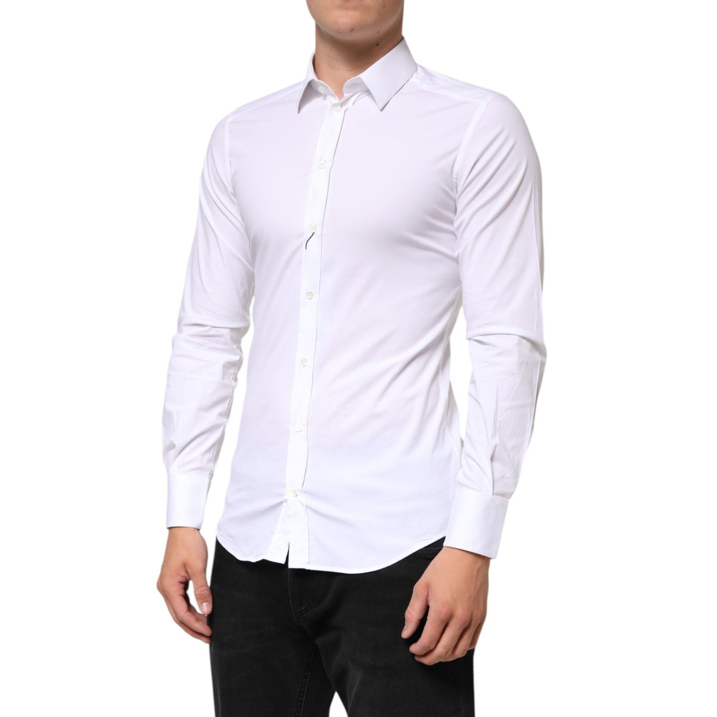 Man wearing Dolce & Gabbana White GOLD Cotton Long Sleeves Dress Men Shirt with a slim fit design for a sharp, elegant look.