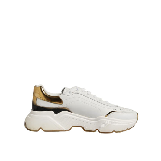 Dolce & Gabbana White Gold Daymaster Low Top Sneakers Shoes in white leather with gold accents, featuring a chunky low-top design.