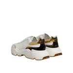 Dolce & Gabbana White Gold Daymaster Low Top Sneakers Shoes with chunky sole and gold accents, rear view.