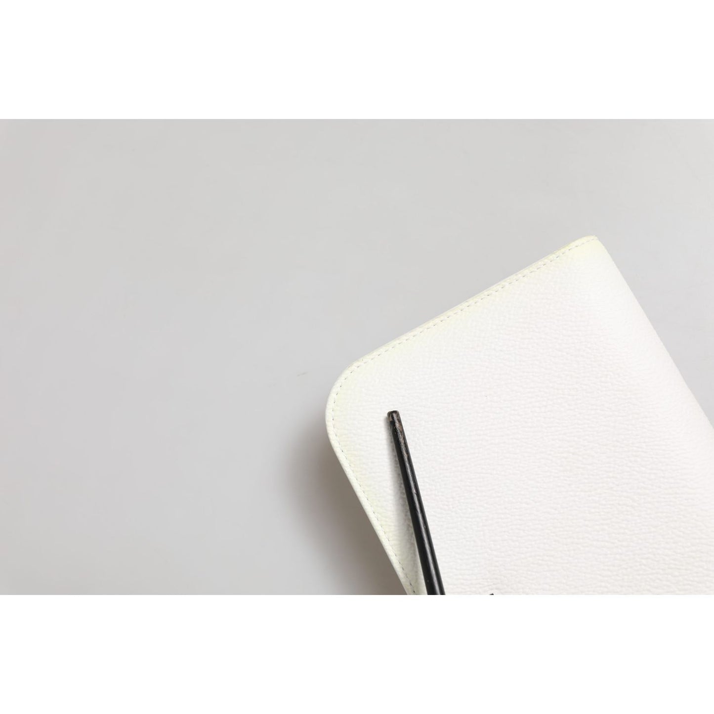Dolce & Gabbana White Leather Logo Plaque Zip Around Continental Wallet with zipper detail.