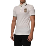 Man wearing Dolce & Gabbana White Logo Embroidery Cotton Polo T-shirt with embroidered logo, short sleeves, and classic collar design.