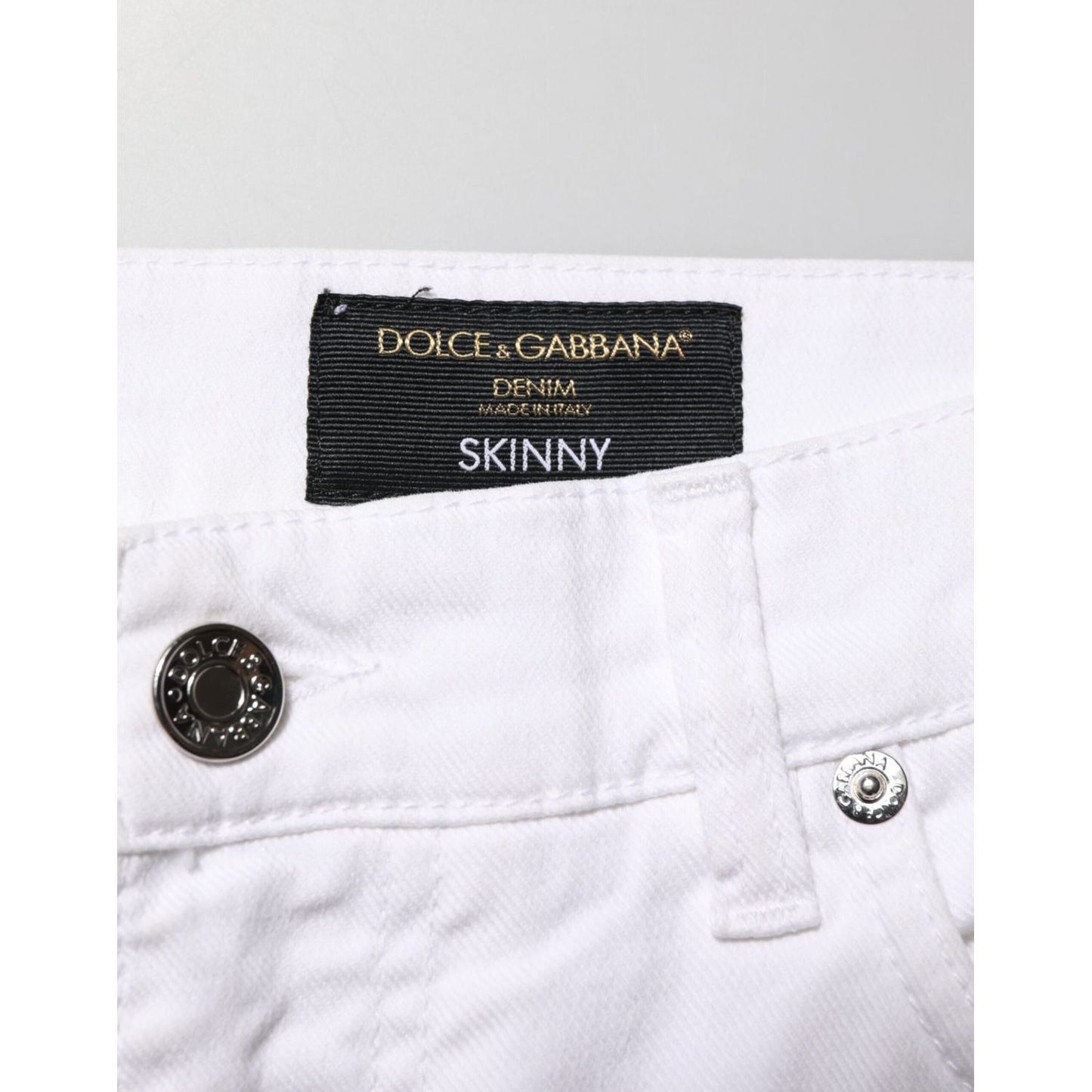 Dolce & Gabbana White Ripped Cotton Skinny Men Denim Jeans with brand label on waistband