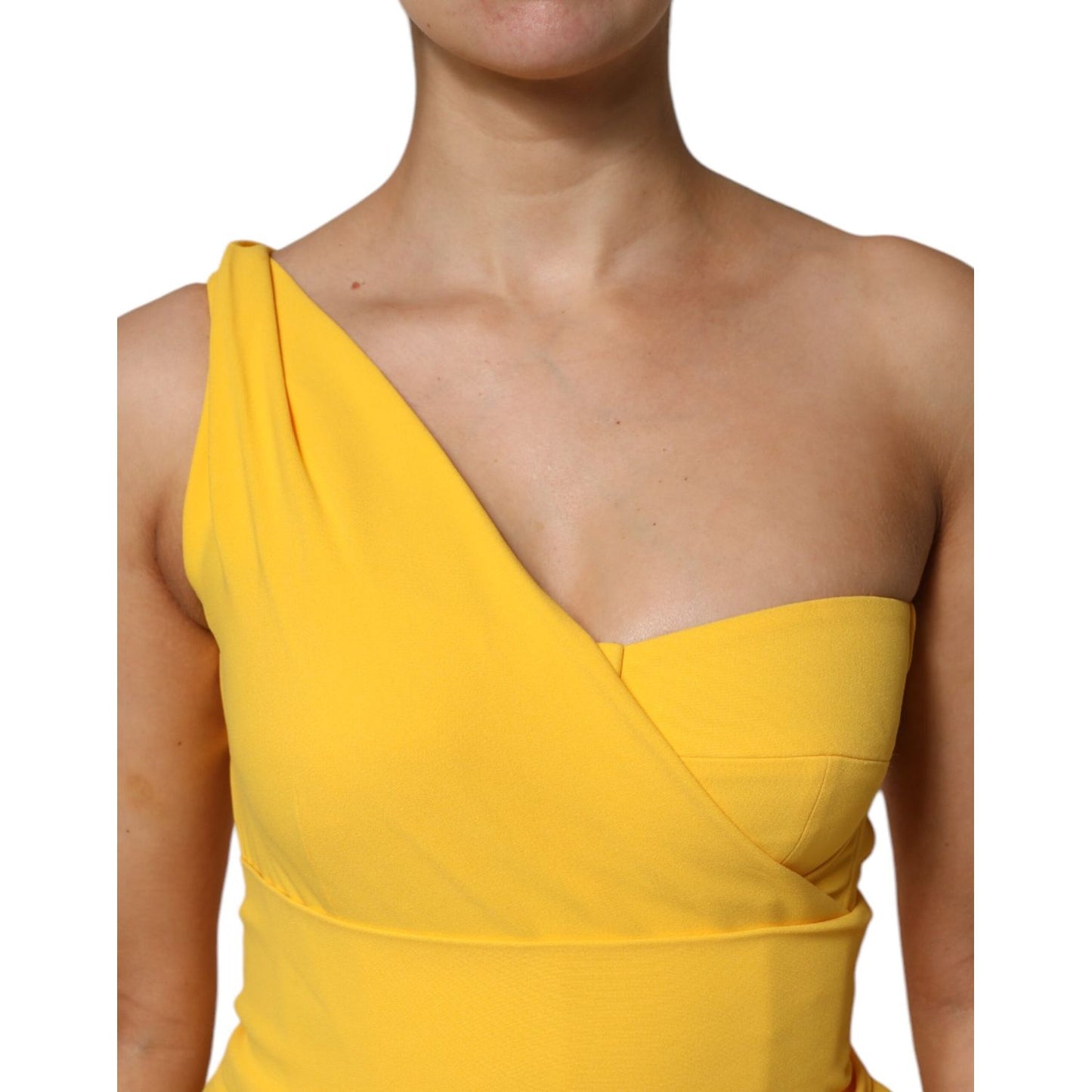 Close-up of Dolce & Gabbana Yellow One Shoulder Side Slit Sheath Dress showcasing the one-shoulder design and vibrant yellow color.