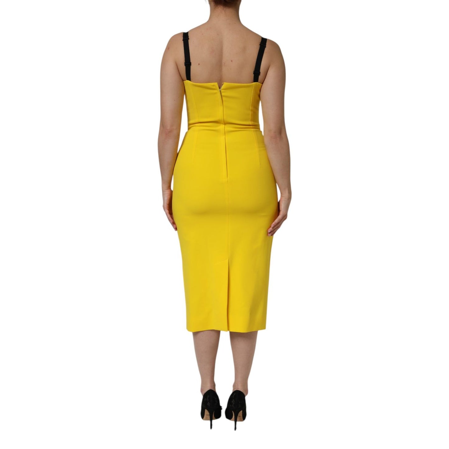 Back view of Dolce & Gabbana Yellow Polyester Sleeveless Sheath Midi Dress showcasing elegant design.