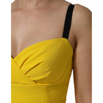 Close-up of Dolce & Gabbana Yellow Polyester Sleeveless Sheath Midi Dress with black straps and pleated bust detail.