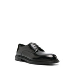 EMPORIO ARMANI EXCLUSIVE Derby shoes in buffed leather with black patent finish, almond toe, and rubber sole on white background.