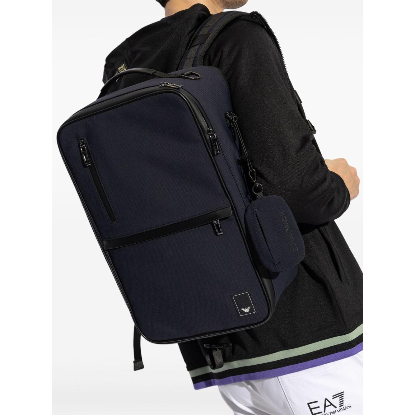Front view with bag zipped and handles upright.