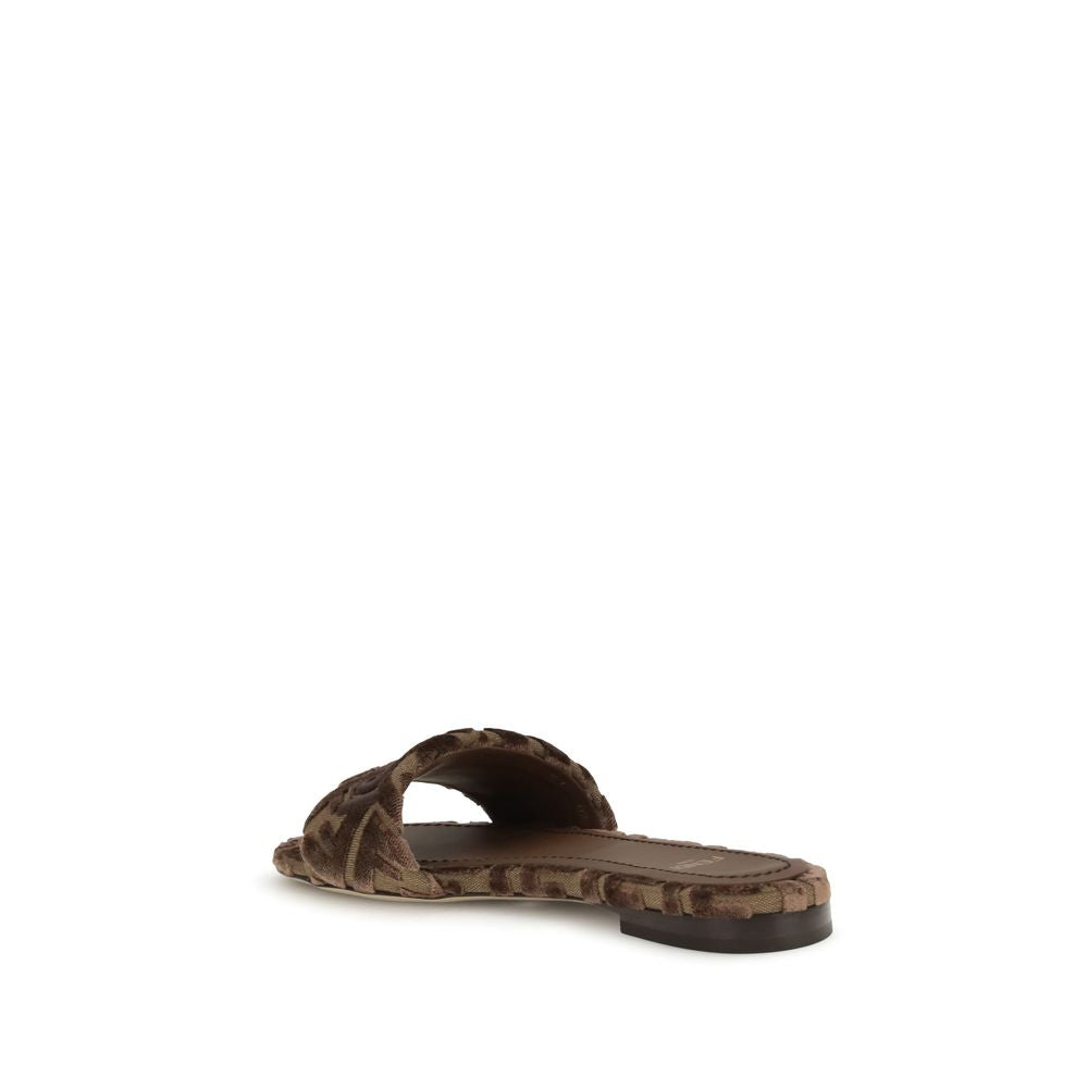 Fendi Brown Viscose Flat Sandals with embroidered logo and open toe design, showcasing elegance and style in a slip-on fashion.