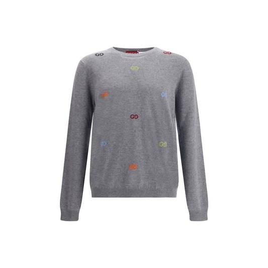 Gucci Gray Cashmere Sweatshirt with multicolor jacquard logo, ribbed crew neck, cuffs and hem, made of 100% cashmere wool.