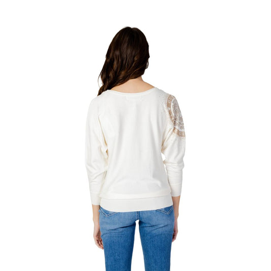 Back view of Guess White Viscose Sportswear sweater with batwing sleeves and logo detail.