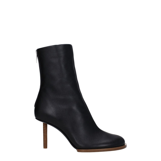 Jacquemus Black Leather Ankle Boots with high heel, square toe, and zip closure, made from leather for stylish casual wear.