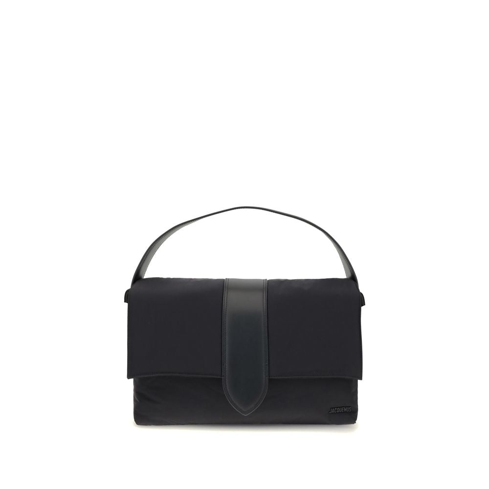 Jacquemus Black Nylon Shoulder Bag with leather handle and magnetic flap, featuring adjustable and removable grosgrain shoulder strap for versatility.