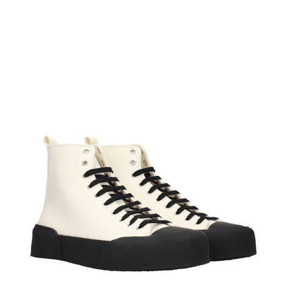 Jil Sander Beige Fabric High Tops with black sole, round toe, and lace-up closure, featuring a back logo. Sporty glam style.