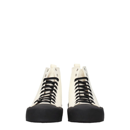 Jil Sander Beige Fabric High Tops with black details, lace-up closure, and rubber sole. Sporty glam style sneakers for a trendy look.