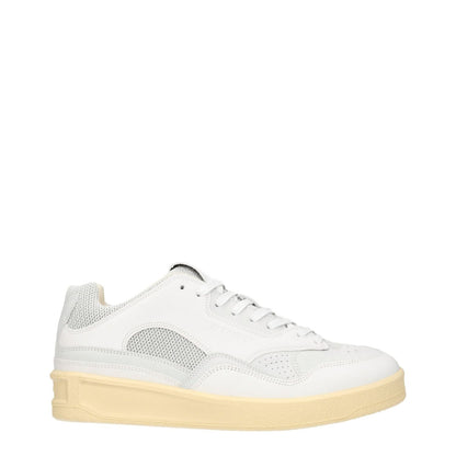 Jil Sander White Leather Low Tops with lace-up closure, round toe, mid heels, and back logo detail, sporty glam style.