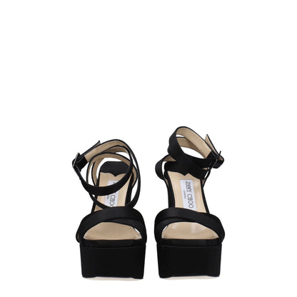 Jimmy Choo Black Satin Platform Sandals with buckle closure, open toe, and high heel. Casual style with leather sole. MPN GAIA140SATBLACK.