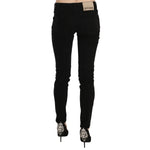 John Galliano Black Mid Waist Slim Fit Skinny Denim Casual Pants Jeans with logo detail and zipper closure, rear view.