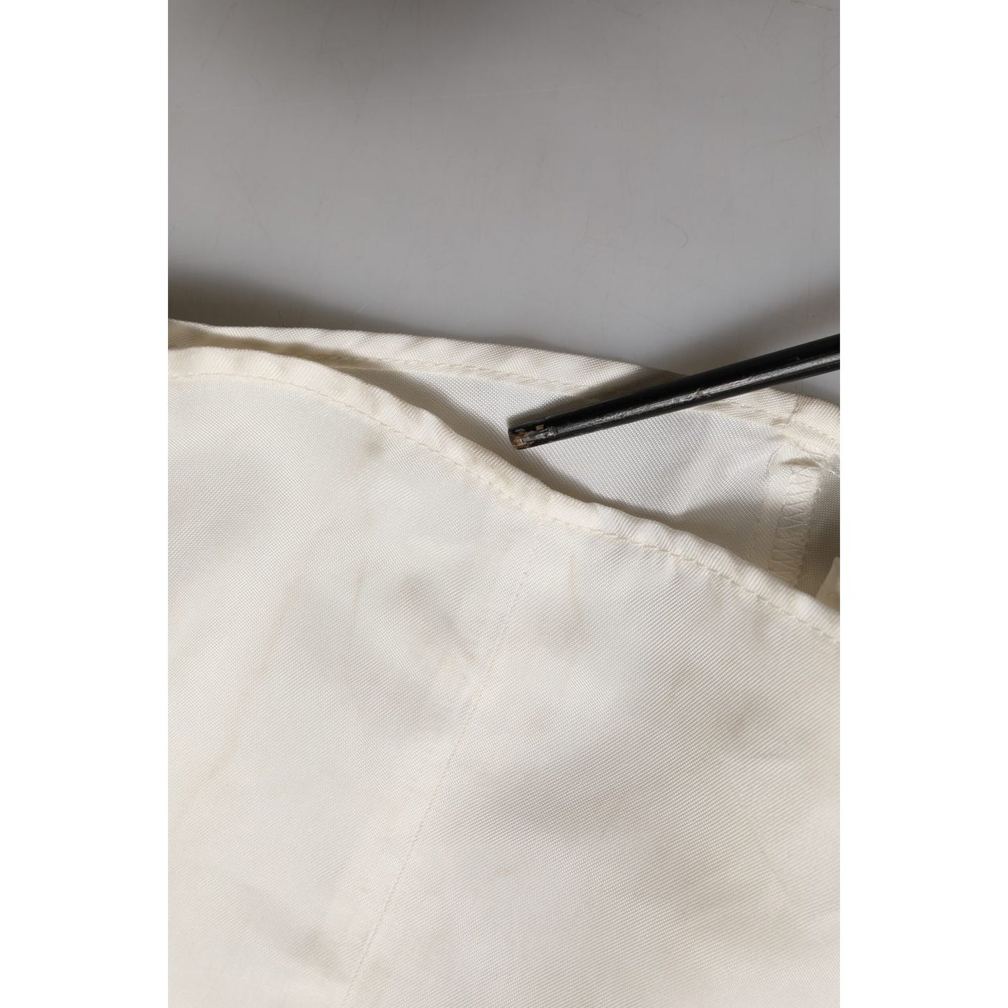 Closeup of L'Autre Chose Ivory White Sleeveless Maxi Cupro Viscose Dress fabric and texture