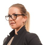 Woman wearing Longines Brown Unisex Glasses Frame with round plastic full-rim design and demo lenses.