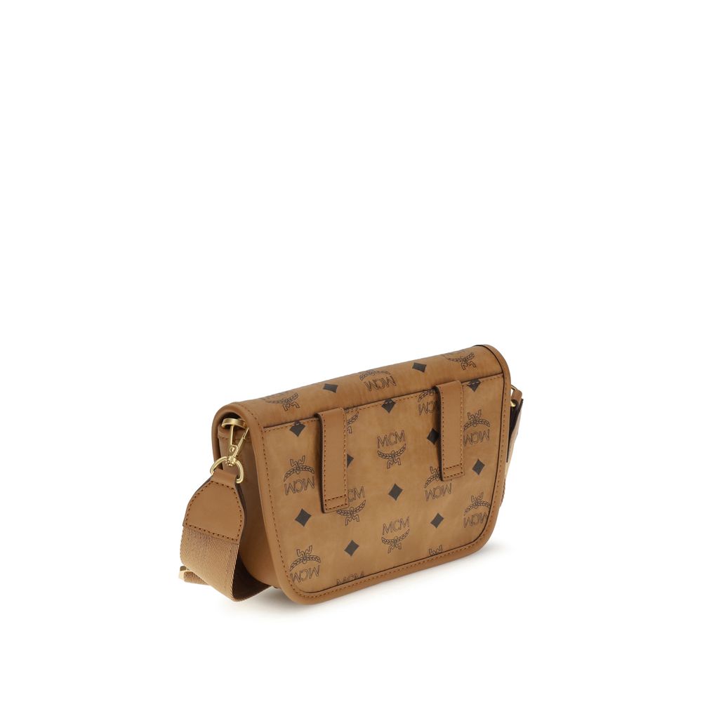 MCM Brown Fabric Shoulder Bag with logo print and rectangular silhouette, showcasing a structured design and calfskin-like texture.
