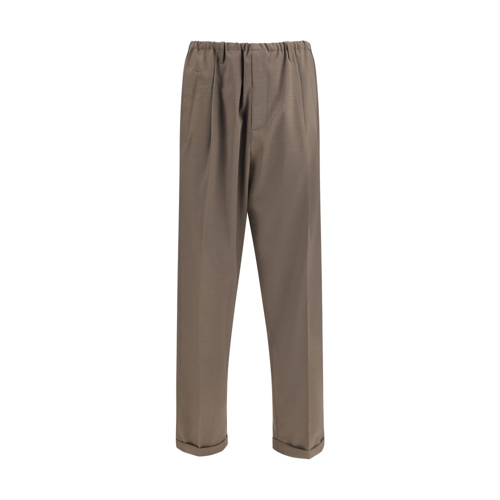 Magliano Brown Polyester Casual Pants with elastic waistband and baggy-cut hem for a relaxed, contemporary look.