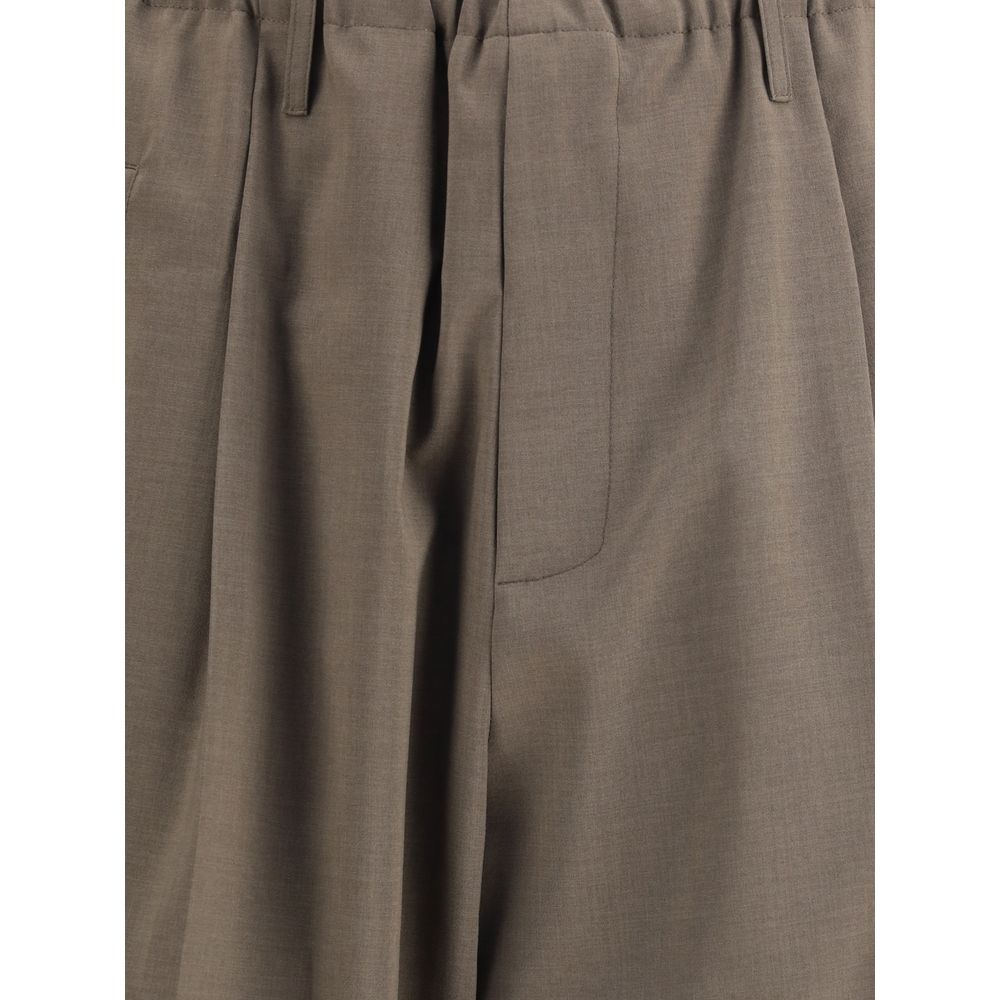 Close-up of Magliano Brown Polyester Casual Pants with elastic waistband and front zipper detailing, ideal for a relaxed and stylish look.