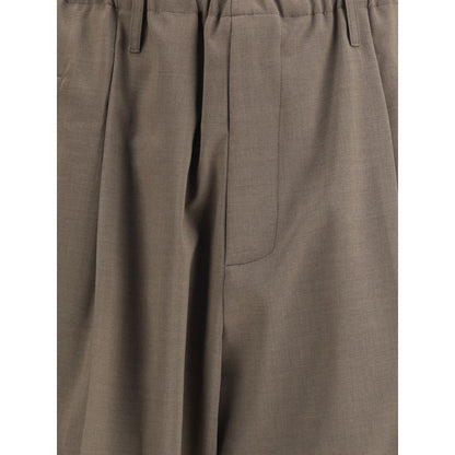 Close-up of Magliano Brown Polyester Casual Pants with elastic waistband and front zipper detailing, ideal for a relaxed and stylish look.