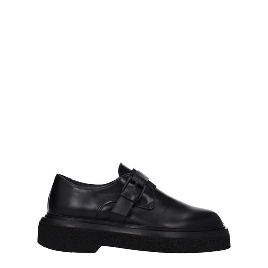 Max Mara Black Leather Oxfords And Derbies with buckle closure and rubber sole, casual round toe design, low flat heel.