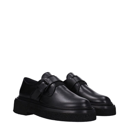 Max Mara Black Leather Oxfords And Derbies with buckle closure and rubber sole.