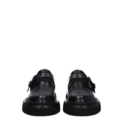 Max Mara Black Leather Oxfords And Derbies with buckle closure, flat heel design, round toe, rubber sole, shown from front view.