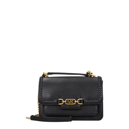 Michael Kors Black Leather Shoulder Bag with gold accents, front logo, adjustable handle, and button closure. Medium size, perfect for casual style.