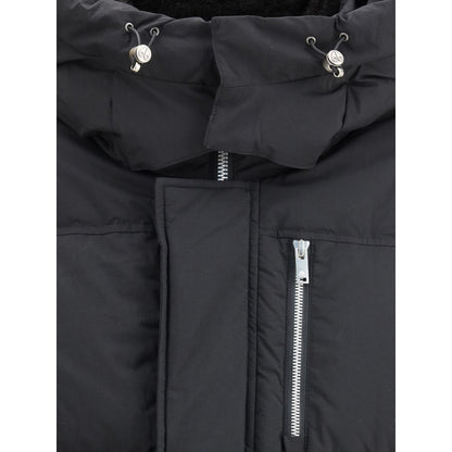 Close-up of removable hood on Moose Knuckles Black Nylon Coat with zipper and snap-button details, showcasing modern winter outerwear design.