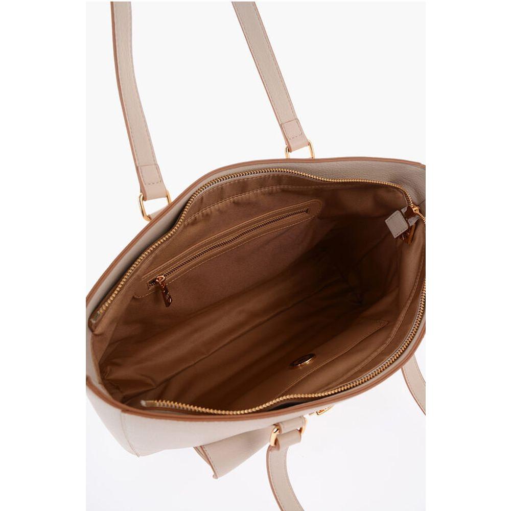 Front view with bag zipped and handles upright.