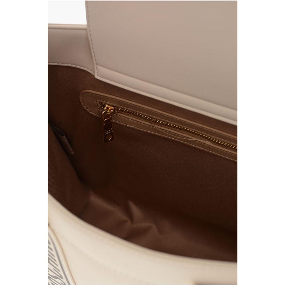 Front view with bag zipped and handles upright.