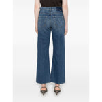 Back view of model wearing Mother Jeans Blue with classic five pockets and whiskering effect, highlighting the indigo denim and ankle length.