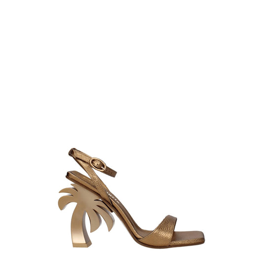 Palm Angels Gold Leather Platform Sandals with palm tree heel design, featuring a buckle closure and open toe in dark gold.