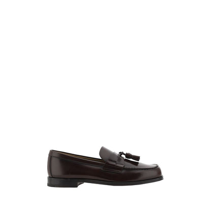Prada Brown Calf Leather Bos Taurus Slip-On Loafers with leather tassel detail, ideal for AW25 collections.