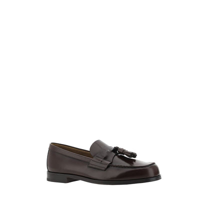Prada Brown Calf Leather Bos Taurus Slip-On Loafers with tassel detail, elegant design for AW25 season.