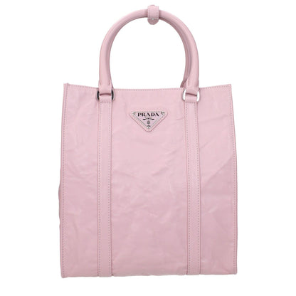 Prada Pink Leather Handbag with front logo, adjustable shoulder strap, and silver details. Small size, 22x25x9 cm. MPN: 1BG458UVL.