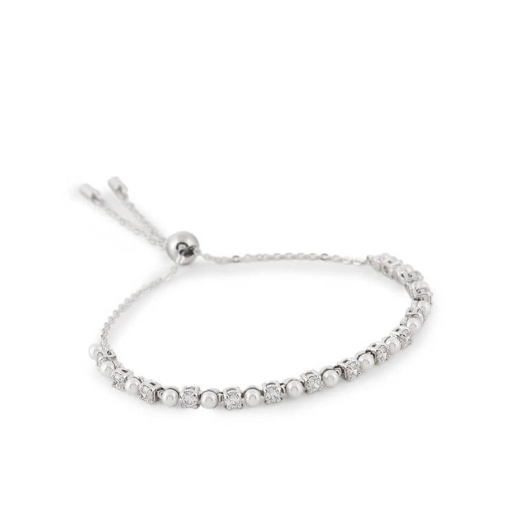 SWAROVSKI Mod. 5689633 Matrix Tennis bracelet features alternating Swarovski Crystal Pearls and Swarovski Zirconia.